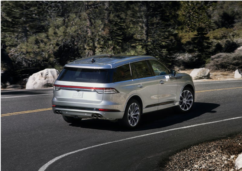 A Lincoln Aviator® is being driven on a winding road | Star Lincoln in Southfield MI