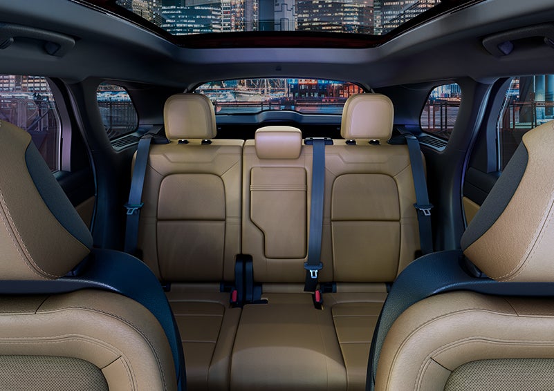 The spaciousness of the second row of the 2023 Lincoln Corsair® SUV is shown. | Star Lincoln in Southfield MI