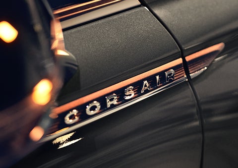 The stylish chrome badge reading “CORSAIR” is shown on the exterior of the vehicle. | Star Lincoln in Southfield MI