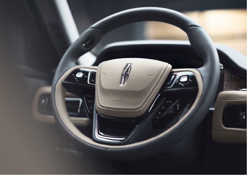 The intuitively placed controls of the steering wheel on a 2023 Lincoln Aviator® SUV | Star Lincoln in Southfield MI