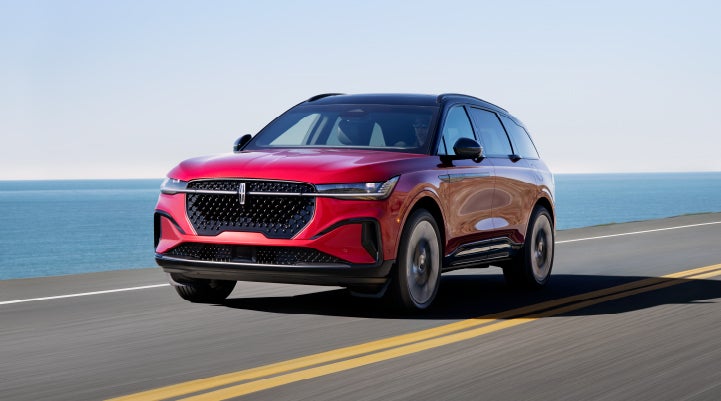 A 2024 Lincoln Nautilus® SUV is being driven on a seaside roadway. | Star Lincoln in Southfield MI