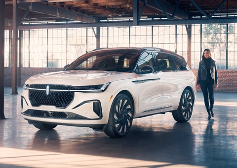 A person approaches a 2024 Lincoln Nautilus® SUV. | Star Lincoln in Southfield MI