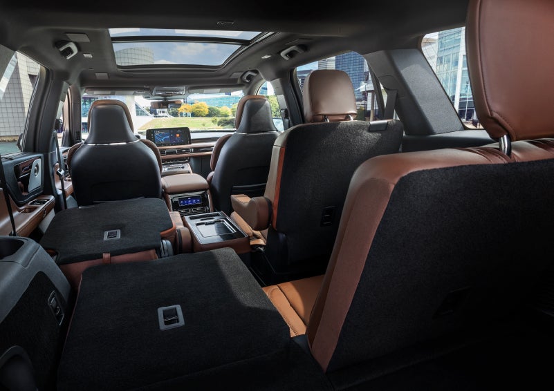 The interior of the 2025 Lincoln Aviator® SUV is shown with two seats folded down for added space. | Star Lincoln in Southfield MI