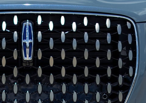 A 2025 Lincoln Corsair® Grand Touring model is shown in the Whisper Blue exterior color.