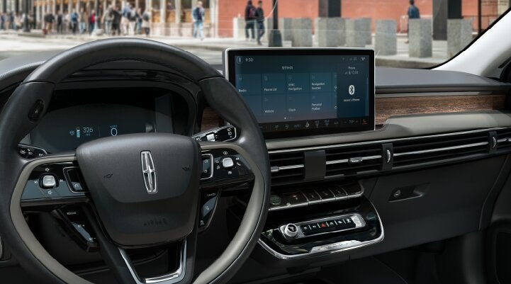 The center screen of the new 2025 Lincoln Corsair® SUV is showcased with its SYNC® 4 capabilities highlighted | Star Lincoln in Southfield MI