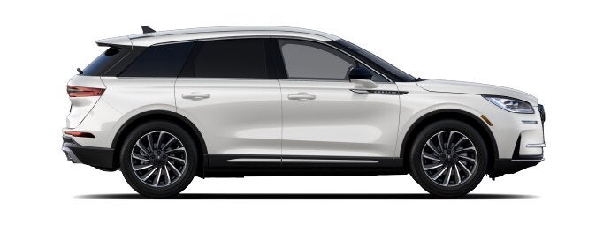 The passenger side of a Lincoln Corsair® SUV is shown in the Ceramic Pearl extra-cost exterior paint option. | Star Lincoln in Southfield MI