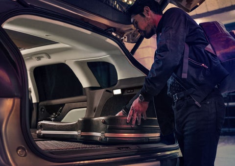 The driver of a 2024 Lincoln Corsair® SUV is shown selecting the drive mode. | Star Lincoln in Southfield MI