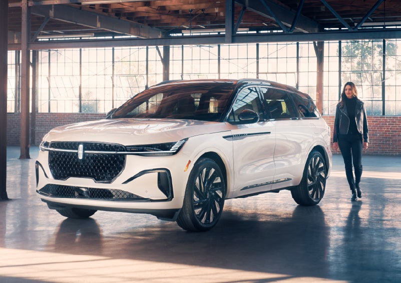 A person approaches a 2025 Lincoln Nautilus® SUV. | Star Lincoln in Southfield MI