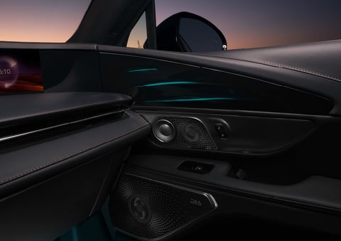 Selectable ambient lighting glows in the passenger door panel. | Star Lincoln in Southfield MI