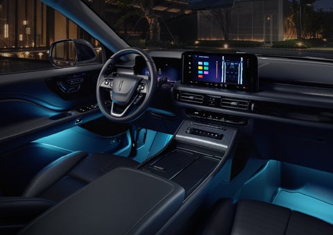 Deep blue Ambient Lighting glows from various places within a 2026 Lincoln Aviator® SUV. | Star Lincoln in Southfield MI