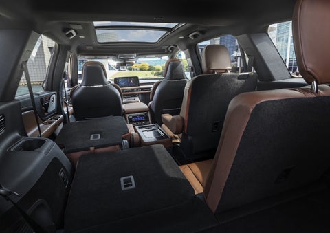 One side of the PowerFold® third-row seat and a second-row seat are folded forward in the 2026 Lincoln Aviator® SUV. | Star Lincoln in Southfield MI