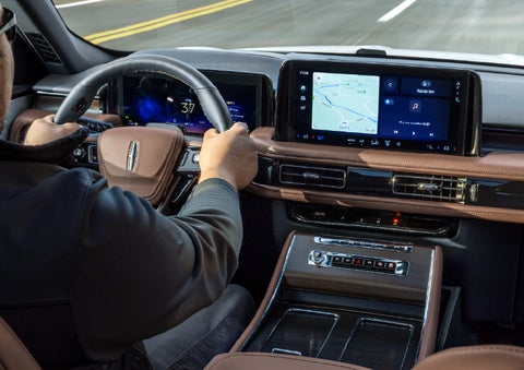 A person is driving a 2026 Lincoln Aviator® SUV as seen from inside the cabin. | Star Lincoln in Southfield MI