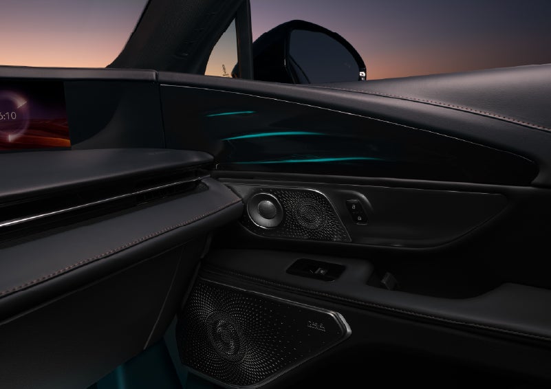 Selectable ambient lighting glows in the passenger door panel. | Star Lincoln in Southfield MI