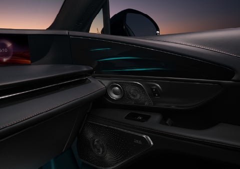 Selectable ambient lighting glows in the passenger door panel. | Star Lincoln in Southfield MI