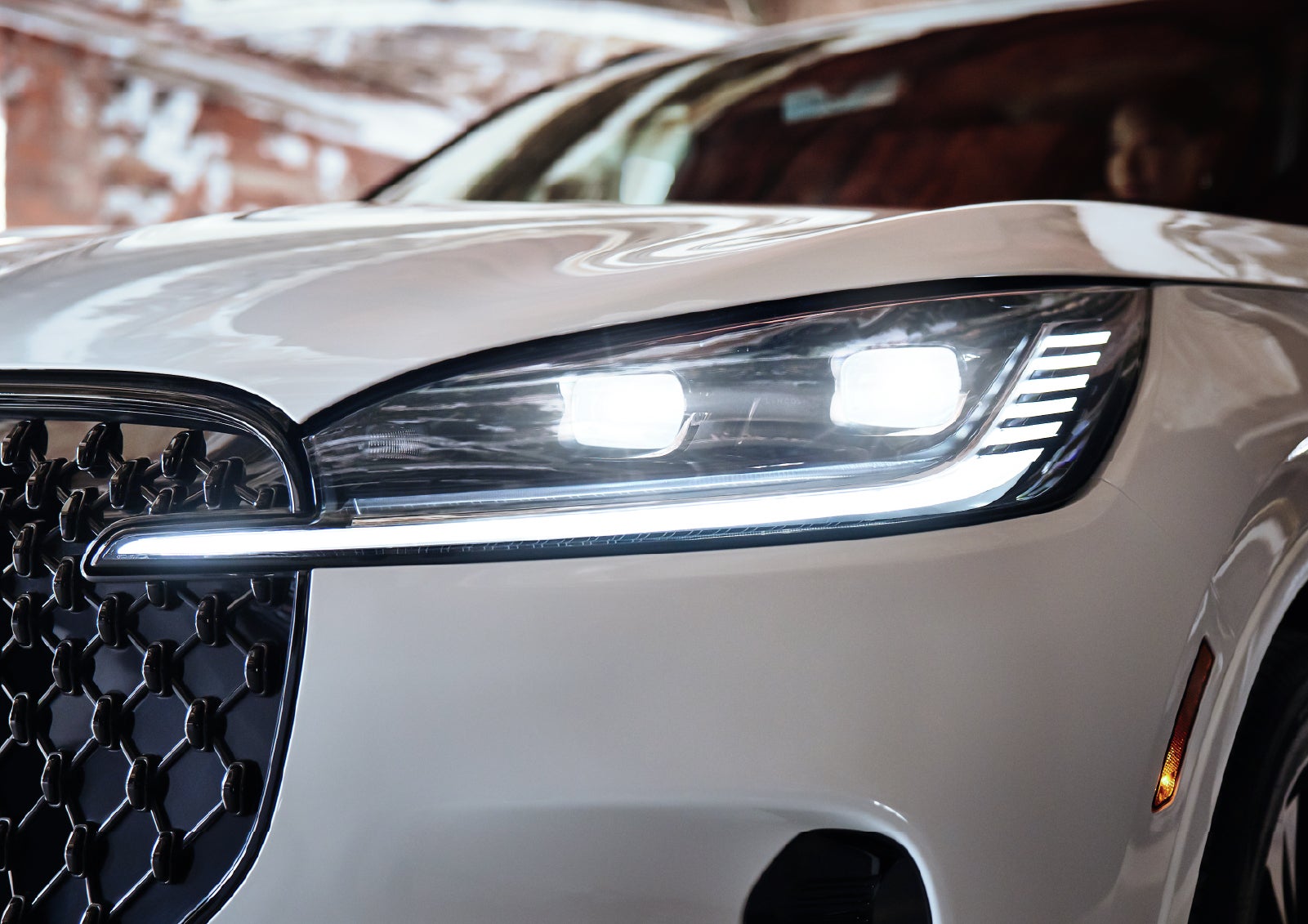 A close-up of a headlamp on the 2027 Lincoln Aviator® SUV is shown. | Star Lincoln in Southfield MI