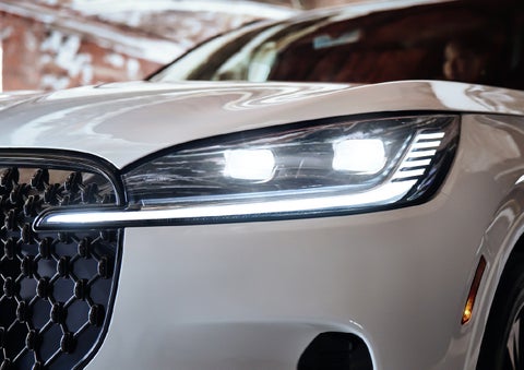 A close-up of a headlamp on the 2027 Lincoln Aviator® SUV is shown. | Star Lincoln in Southfield MI