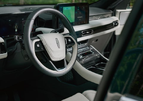 The leather-trimmed steering wheel of a 2027 Lincoln Aviator® Black Label™ SUV. | Star Lincoln in Southfield MI